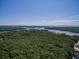 Breathtaking aerial view of lush landscapes with river winding through forests at 293 Hillsborough Dr., Conway, SC 29526
