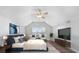 Bright bedroom with vaulted ceiling, ceiling fan, and television at 293 Hillsborough Dr., Conway, SC 29526