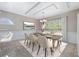 Bright dining room showcasing a modern table set, stylish lighting, and a cozy atmosphere at 293 Hillsborough Dr., Conway, SC 29526