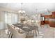 Elegant dining area with stylish furnishings, modern lighting, and an open-concept design at 293 Hillsborough Dr., Conway, SC 29526