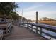 Charming wooden boardwalk with views of the serene river, blending nature and convenience at 293 Hillsborough Dr., Conway, SC 29526