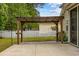 Backyard view features a covered patio pergola and a concrete patio, perfect for relaxing at 293 Hillsborough Dr., Conway, SC 29526