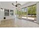 Enclosed sunroom with many large windows and tile flooring; ideal for enjoying the outdoors at 293 Hillsborough Dr., Conway, SC 29526