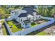 The back exterior features a large backyard with a playground and a patio at 3300 Prioloe Dr., Myrtle Beach, SC 29588