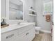 Bathroom featuring white vanity, a framed mirror, and tile flooring at 3300 Prioloe Dr., Myrtle Beach, SC 29588