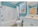 Bathroom featuring white sink, tub with shower, and a window at 3300 Prioloe Dr., Myrtle Beach, SC 29588