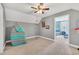 Bedroom with climbing gym, carpet floors, and an ensuite at 3300 Prioloe Dr., Myrtle Beach, SC 29588