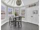 Bright dining area with skylight ceiling and views to the backyard at 3300 Prioloe Dr., Myrtle Beach, SC 29588