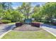 A landscaped entrance sign with lush plantings leads into the community at 3300 Prioloe Dr., Myrtle Beach, SC 29588