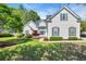 Charming home with well-manicured lawn, white siding, and beautiful landscaping at 3300 Prioloe Dr., Myrtle Beach, SC 29588
