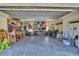 Spacious garage featuring ample storage shelves, perfect for organizing tools and equipment at 3300 Prioloe Dr., Myrtle Beach, SC 29588