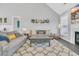Spacious living room featuring fireplace, comfortable seating and stylish decor at 3300 Prioloe Dr., Myrtle Beach, SC 29588