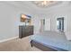Serene bedroom featuring tray ceiling, a neutral palette, and an adjacent walk-in closet at 3300 Prioloe Dr., Myrtle Beach, SC 29588