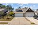 Charming two-story home with two car garage, concrete driveway, and landscaped yard at 351 Logan St., Little River, SC 29566