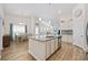 Open concept kitchen flows into the living and dining area with an island and breakfast bar at 351 Logan St., Little River, SC 29566