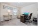 Comfortable office space featuring carpeted floors, a desk, a side table and a comfortable side chair at 351 Logan St., Little River, SC 29566