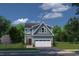Charming two-story home with gray siding, white trim, a two-car garage, and a well-maintained lawn at 439 Myrtle Meadows Dr, Conway, SC 29526