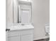 Bright bathroom features a marble countertop, modern mirror, and white vanity at 500 Dundalk Dr., Conway, SC 29526