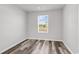 Small bedroom with light gray walls and a single window to provide natural light at 500 Dundalk Dr., Conway, SC 29526