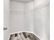 Walk-in closet with wood floors, wire shelving and neutral walls at 500 Dundalk Dr., Conway, SC 29526