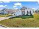 Exterior view of a well-maintained home with manicured lawn and driveway at 500 Dundalk Dr., Conway, SC 29526