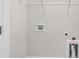 Laundry room ready with washer and dryer hookups, as well as a wire shelf for storage at 500 Dundalk Dr., Conway, SC 29526