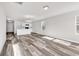 Open living room with a kitchen and dining area nearby with lots of natural light at 500 Dundalk Dr., Conway, SC 29526