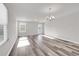 Bright, open floor plan featuring stylish floors, neutral walls, and lots of natural light at 500 Dundalk Dr., Conway, SC 29526