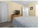 Cozy bedroom with a comfortable bed, a TV, and ample closet space at 5000 N Ocean Blvd. # B-1, North Myrtle Beach, SC 29582