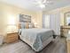 Comfortable bedroom featuring beach decor and a ceiling fan at 5000 N Ocean Blvd. # B-1, North Myrtle Beach, SC 29582