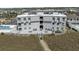 Rear of condo with outdoor lounge furniture on spacious deck at 5000 N Ocean Blvd. # B-1, North Myrtle Beach, SC 29582