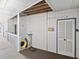Hallway showing exterior unit entrances and beach equipment at 5000 N Ocean Blvd. # B-1, North Myrtle Beach, SC 29582