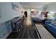 Studio bedroom showcasing open layout with dining area, queen bed, and comfortable blue sofa at 5300 N Ocean Blvd. # 106, Myrtle Beach, SC 29577