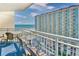 Enjoy the ocean views from this condo balcony, with seating for relaxing outside at 5300 N Ocean Blvd. # 922, Myrtle Beach, SC 29572