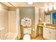 Well-lit bathroom featuring a shower-tub combination, granite vanity, and essential amenities at 5300 N Ocean Blvd. # 922, Myrtle Beach, SC 29572