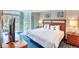 Comfortable bedroom with a king sized bed, ocean views, and balcony access at 5300 N Ocean Blvd. # 922, Myrtle Beach, SC 29572