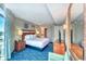 This bedroom features a king bed, stylish décor, and a view from the large window at 5300 N Ocean Blvd. # 922, Myrtle Beach, SC 29572