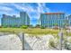 Beautiful condo buildings are enhanced by lush landscaping and beach access at 5300 N Ocean Blvd. # 922, Myrtle Beach, SC 29572