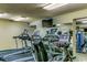 Well-equipped gym featuring modern treadmills, stationary bikes, mirrored walls, and a flat screen TV for effective workouts at 5300 N Ocean Blvd. # 922, Myrtle Beach, SC 29572