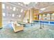 Bright lobby with high ceilings, skylights, comfortable seating, and a reception desk at 5300 N Ocean Blvd. # 922, Myrtle Beach, SC 29572