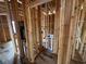 Plumbing and electrical components visible in a framed wall during the construction phase, showcasing the home's infrastructure at 6001 - 5142 S Kings Hwy., Myrtle Beach, SC 29575