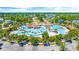 Aerial view of the expansive community pool with intricate water features, surrounded by lush landscaping and inviting lounge areas at 756 Waterbridge Blvd., Myrtle Beach, SC 29579