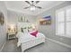 Charming bedroom featuring a window with shutters, a ceiling fan, and soothing gray walls at 756 Waterbridge Blvd., Myrtle Beach, SC 29579