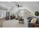 Spacious living room featuring dormer windows, vaulted ceilings, and comfortable seating at 756 Waterbridge Blvd., Myrtle Beach, SC 29579