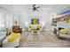 Bright living room with coffered ceilings, a fireplace, a ceiling fan, and stylish furniture at 756 Waterbridge Blvd., Myrtle Beach, SC 29579