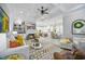 Open concept living area with built-in shelving, fireplace, kitchen, and dining space at 756 Waterbridge Blvd., Myrtle Beach, SC 29579
