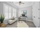 Bright office with plantation shutters, stylish desk, and ceiling fan at 756 Waterbridge Blvd., Myrtle Beach, SC 29579