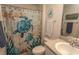 Full bathroom featuring turtle-themed shower curtain, decor, and vanity at 884 Freestyle Ct., Longs, SC 29568