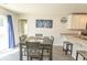 Bright dining area with sliding glass doors and views of the backyard at 884 Freestyle Ct., Longs, SC 29568