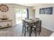 Cozy dining area with a sliding glass door and stylish nautical decor at 884 Freestyle Ct., Longs, SC 29568